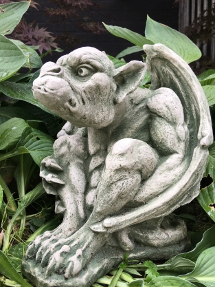 Gargoyle figure medieval dragon demon protector church figures.